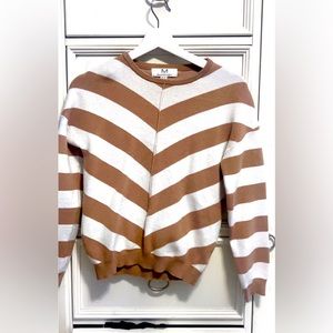 Magaschoni XS sweater thing- it’s pretty short but y’all skinny queens will love